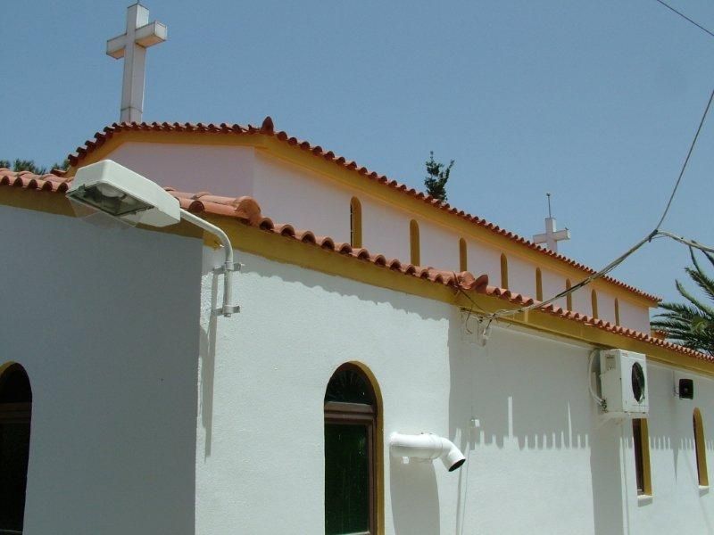 Εξωτερική ανακαίνιση, μόνωση χρωματισμός τοίχων, νέα κεραμίδια στο καμπαναριό.
