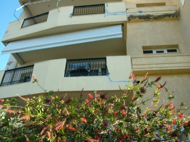 Επισκευές οπλισμού, μονώσεις τοίχων, χρωματισμός υγρομόνωση ταράτσας.