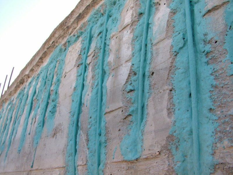 Επισκευές οπλισμού, μονώσεις τοίχων, χρωματισμός υγρομόνωση ταράτσας.